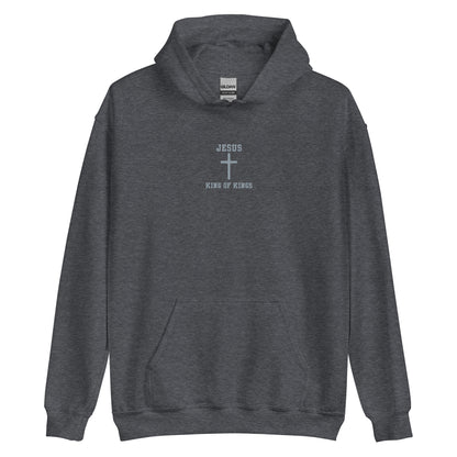 On the front of this custom embroidered unisex hooded sweatshirt are the words Jesus King of Kings with a Jesus cross in the center embroidered into the upper middle of the hoodie in silver thread.
