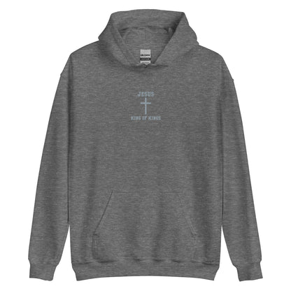 On the front of this custom embroidered unisex hooded sweatshirt are the words Jesus King of Kings with a Jesus cross in the center embroidered into the upper middle of the hoodie in silver thread.