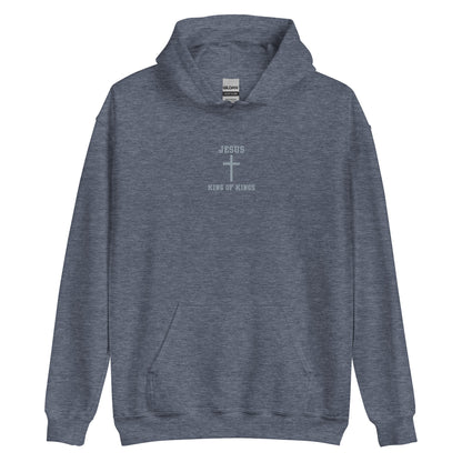 On the front of this custom embroidered unisex hooded sweatshirt are the words Jesus King of Kings with a Jesus cross in the center embroidered into the upper middle of the hoodie in silver thread.