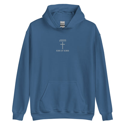 On the front of this custom embroidered unisex hooded sweatshirt are the words Jesus King of Kings with a Jesus cross in the center embroidered into the upper middle of the hoodie in silver thread.