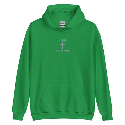 On the front of this custom embroidered unisex hooded sweatshirt are the words Jesus King of Kings with a Jesus cross in the center embroidered into the upper middle of the hoodie in silver thread.
